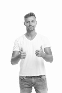 Happy handsome man smile showing approval sign hand gesture isolated on white, thumbs-ups.